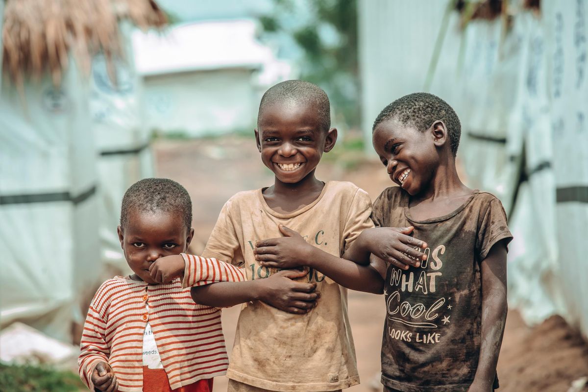 Children laughing together in their community
